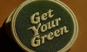 A patch embroidered with the words ‘get your green'